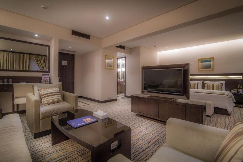 Golden Tulip Bahrain Hotell Manama Rom bilde